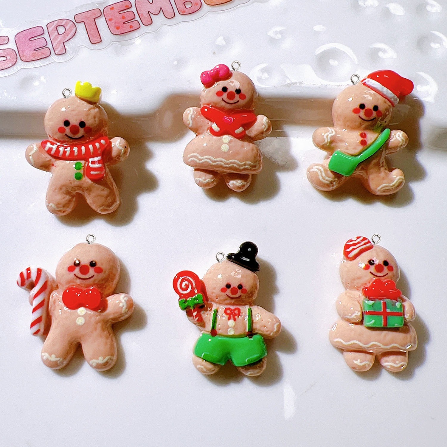 10Pcs Cute Christmas Doll Plan - Resin Art Earrings Material recension och pris